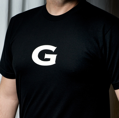 Merch T shirt black with a text G